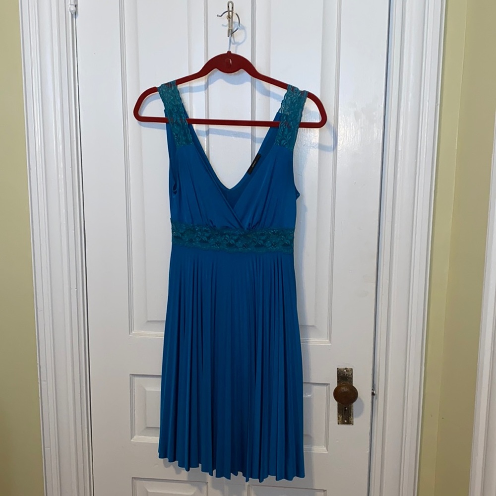 Beautiful turquoise dress with pleats and lace